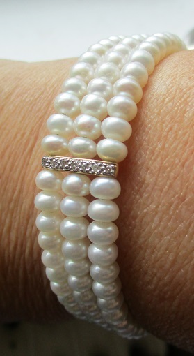xxM1366M 14k gold and diamond, pearl braceletTakst-Valuation Nr.Kr. 5000